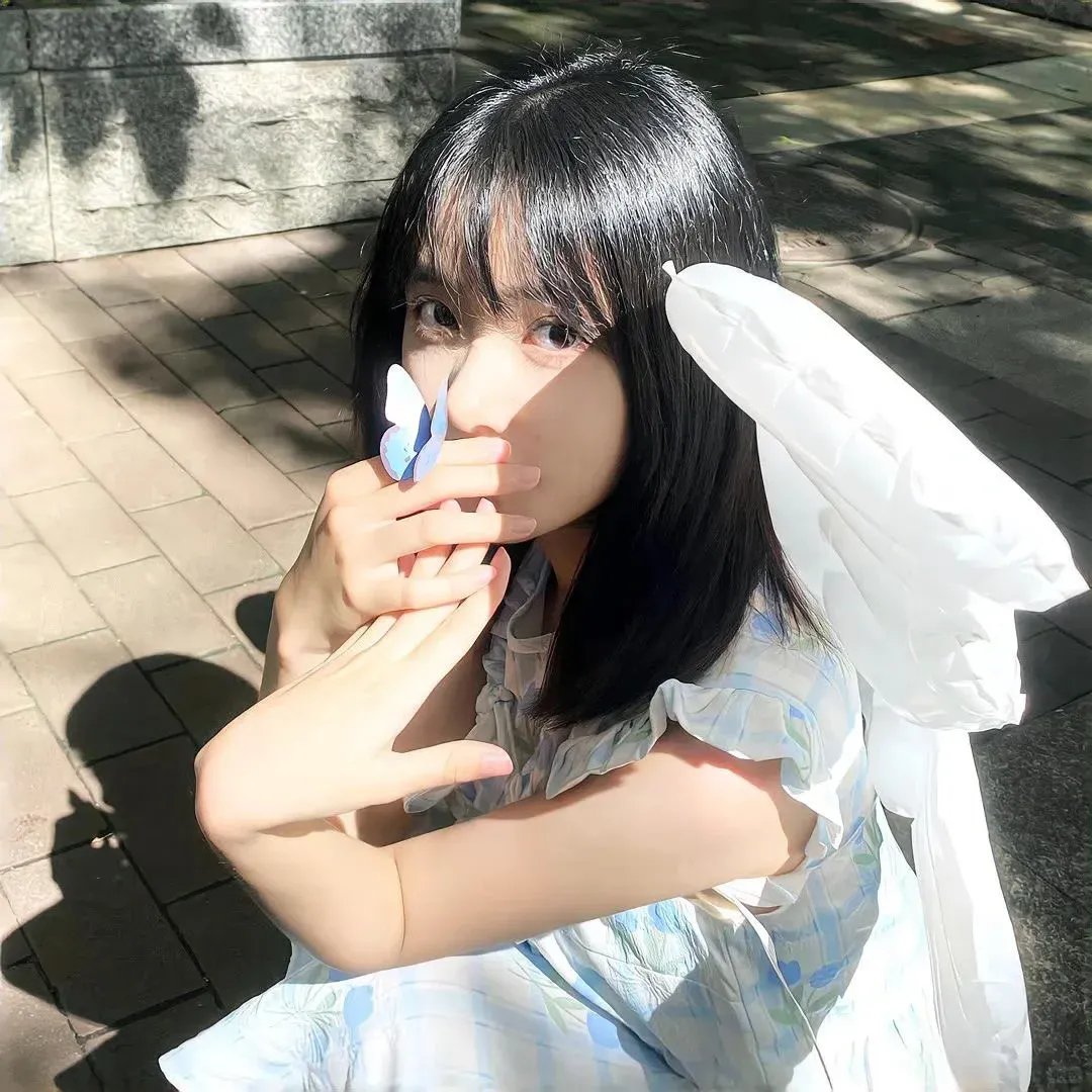 桃花含露又春风